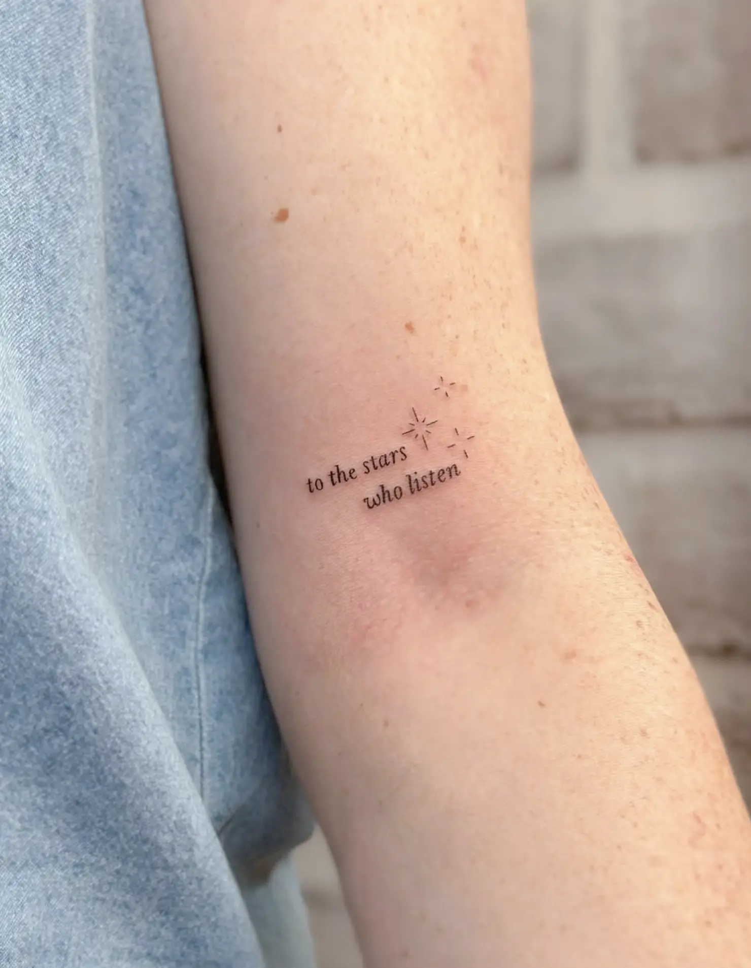 What are the downsides of fine-line tattoos?